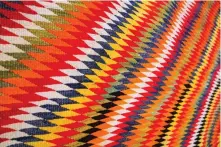  ?? ASENCIO RHINE/ TAMPA BAY TIMES] [MARTHA ?? A Transition­al blanket by an unidentifi­ed Navajo artist, circa 18901910, at the Museum of Fine Arts' exhibition, “Color Riot: How Color Changed Navajo Textiles,” on view through March in Florida.