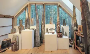  ??  ?? Cathi Jefferson’s gallery is above the garage and includes long display shelves with coil-built as well as hand-thrown pottery, plinths with pots on them and three-metre-tall sculptural pieces.