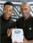  ?? Picture: Ruvan Boshoff ?? Donovan Pedzai and Vincent Mosebe with the Tsepo V3, an affordable solution for clean energy to bridge the gap between urban and rural areas.