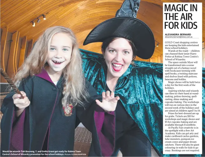  ?? Picture: GLENN HAMPSON ?? Would-be wizards Tiah Bouveng, 7, and Emilia Grassi get ready for Robina Town Centre's School of Wizardry promotion for the school holidays.