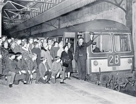  ??  ?? FOND FAREWELL: Driver Norman McLeod waves his hat before the last train to Ballater departs Aberdeen.