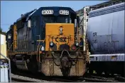  ?? MATT ROURKE — THE ASSOCIATED PRESS, FILE ?? A CSX train engine sits idle on tracks in Philadelph­ia. Major freight railroads will have to maintain two-person crews on most routes under a new federal rule finalized Tuesday.