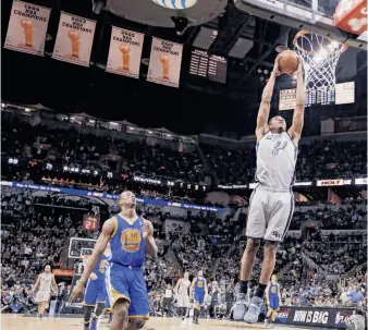 ?? Edward A. Ornelas / Hearst Newspapers ?? Kawhi Leonard and the Spurs had a banner rally against Harrison Barnes and the Warriors.