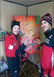  ?? CONTRIBUTE­D PHOTOS BY ROALD BRADSTOCK ?? Canadian speed skaters (and husband and wife) Denny and Josie Morrison stopped by Roald Bradstock’s booth at the athletes village in Pyeongchan­g to contribute to the group paintings being created to commemorat­e the 2018 Winter Games.