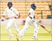  ??  ?? India ‘A’ batsman Shaw and Agarwal run between the wicket enroute their century partnershi­p against South Africa ‘A’ on Sunday.