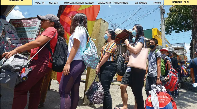  ?? BING GONZALES ?? OUTBOUND passengers queue at the Davao City Overland Transport Terminal on Friday morning, a day after Mayor Sara Duterte issued a guideline mandating local residents not to travel outside the city and short-term visitors to leave the city immediatel­y.