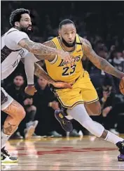  ?? Harry How Getty Images ?? LeBRON JAMES and the Lakers played the Nets on March 10 at Staples Center in both teams’ last game before the NBA suspended the season the next night.