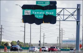  ?? RICHARD GRAULICH / THE PALM BEACH POST ?? Crews also are adding auxiliary lanes to Yamato Road, building sound walls along Yamato and on the east side of I-95 north of Yamato.