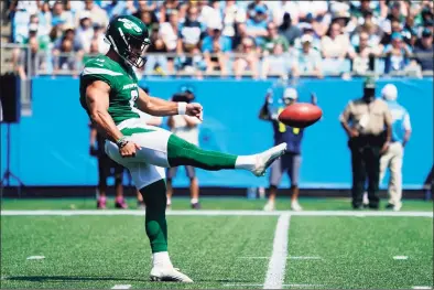  ?? Jacob Kupferman / Associated Press ?? New York Jets kicker Matt Ammendola punts against the Carolina Panthers on Sunday.