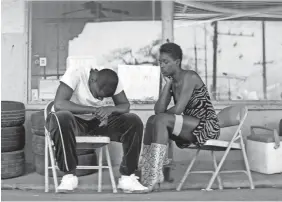  ?? UNIVERSAL PICTURES VIA AP ?? Slim (Daniel Kaluuya), left, and Queen (Jodie Turner-Smith) get to know each other on the lam in “Queen & Slim.”