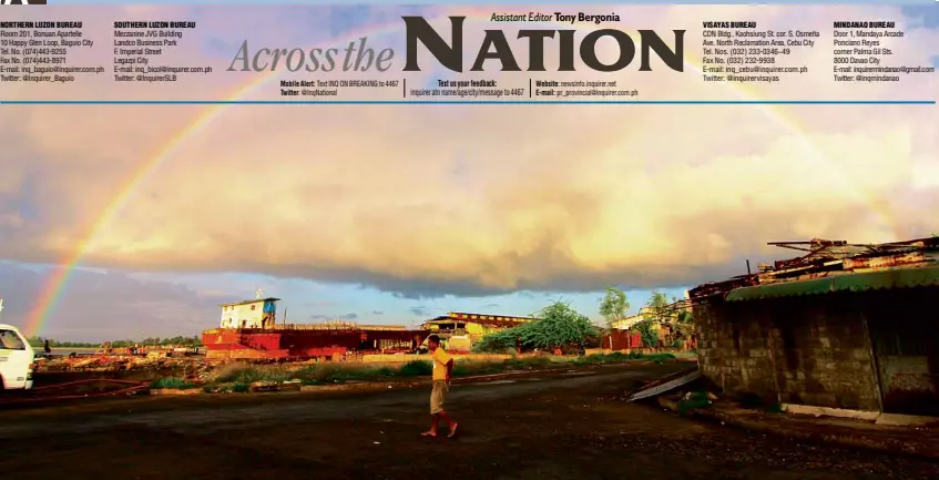  ?? DELFIN MALLARI JR./INQUIRER SOUTHERN LUZON ?? COLORS A rainbow slices the morning sky in the coastal village of Lucena City on Saturday.