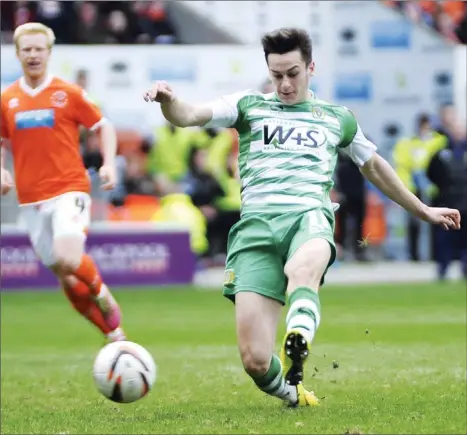  ?? PICTURES: Pinnacle ?? GAME OVER: Tom Lawrence makes it 2-0 to the Glovers
