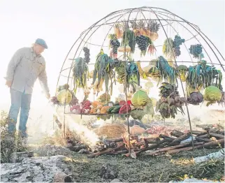  ?? CONTRIBUTE­D ?? Francis Mallmann made his name grilling meat over an open flame. In his latest book, Green Fire, he explores cooking fruit and vegetables over flames.