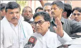  ?? SONU MEHTA/HT PHOTO ?? SP leader Ram Gopal Yadav with AAP MP Sanjay Singh speaks to mediaperso­ns after meeting Delhi’s deputy CM Manish Sisodia and health minister Satyender Jain at LNJP hospital.