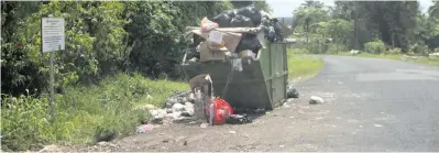  ?? Photo: Lusiana Tuimaisala ?? The full and overflowin­g rubbish dumpster at Godfrey Road in Nasinu on January 11, 2018.