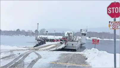  ?? SUBMITTED PHOTO ?? The crew on board the Caolas S’ilis in Little Narrows, one of two provincial cable ferries that operate in Victoria County, waits for traffic Wednesday before crossing St. Patrick’s Channel.