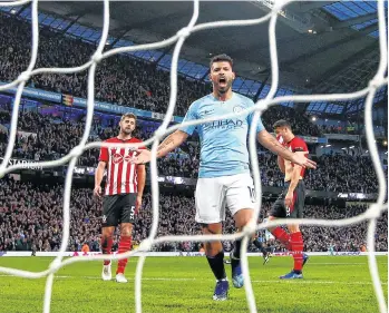  ?? /GETTY IMAGES ?? Sergio Agüero, quien sumó su gol 150, celebra el quinto tanto del City.