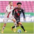  ?? FOTO: DPA ?? Kölns Jannes Horn (l.) im Laufduell mit Bayerns Leroy Sané.