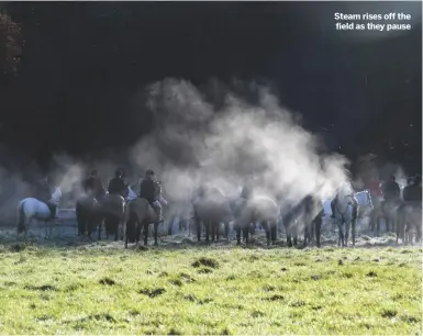  ??  ?? Steam rises off the field as they pause