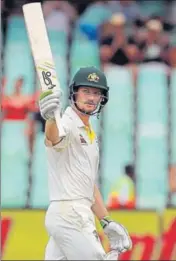  ?? AP ?? Cameron Bancroft acknowledg­es the crowd after reaching his half century on Day Three of the first Test against South Africa.