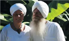  ??  ?? Devmurti Khalsa, right, and wife Hari Amrit own Figs for Life, a company on Denman Island that sells figs and fig plants.