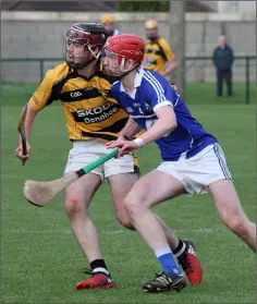  ??  ?? Rathnure’s Ciaran O’Connor collides with Oylegate-Glenbrien’s Mike Kelly at Bellefield.