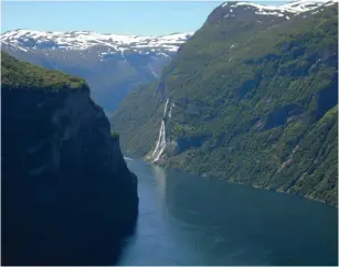  ??  ?? ‘The world’s most beautiful voyage’ along the fjords; Soviet Liberation Monument, left