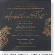  ?? ?? Luxe wedding invitation custom designed for a black-tie event featuring gold-edge detailing, handwritin­g by Calligraph­y Katrina, and rose motifs by Cordially; cordiallyi­nvite.com