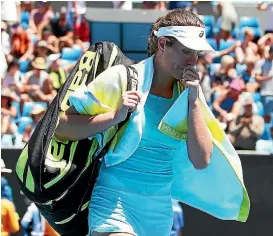  ?? GETTY IMAGES ?? A disappoint­ed Johanna Konta walks off the court after losing her second round match against Bernarda Pera.