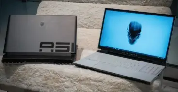  ??  ?? The Alienware Area-51m comes in two colors: Dark Side of the Moon and Lunar White.