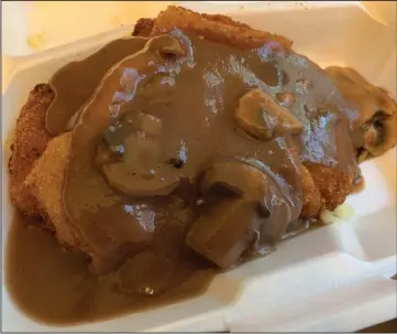  ?? (Arkansas Democrat-Gazette/Eric E. Harrison) ?? The Pantry’s Jager Schnitzel comes with a rich mushroom sauce.