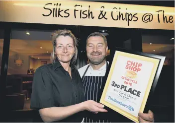  ??  ?? Amanda Sowersby and Matthew Silk with the third place award which went to Silks Fish &amp; Chips @ The Croft, Newby. 184219