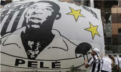  ?? Photograph: Isaac Fontana/EPA ?? Fans attend a vigil for Pelé in front of Albert Einstein hospital in São Paulo, Brazil, on Sunday.