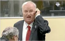  ?? PHOTO: REUTERS ?? Former Bosnian Serb general Ratko Mladic shouts before being removed from the courtroom as the Internatio­nal Criminal Tribunal for the former Yugoslavia delivers its verdicts.