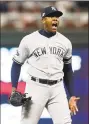  ?? Jim Mone / Associated Press ?? Yankees closer Aroldis Chapman celebrates after his team’s 51 victory over the Twins in Game 3 of the ALDS on Monday night in Minneapoli­s.