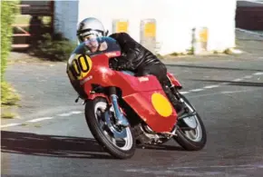  ??  ?? Stuart on his Vendetta-framed Matchless G50 at Ballacrain­e in the 1973 Manx Grand Prix. He hasn’t got a G50 in his collection (yet) but he’s filled the classic racer gap with a highly original AJS 7R