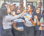  ?? PTI ?? Students celebrate after CBSE declared Class 12 results, at a school in Gurugram, on Friday