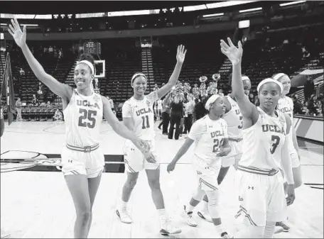  ?? Ted S. Warren Associated Press ?? THE UCLA WOMEN’S BASKETBALL TEAM, including Monique Billings (25), walks off the court after defeating California 77-74 in the quarterfin­als of the Pac-12 women’s tournament in Seattle. The Bruins are seeded third in the NCAA tournament.