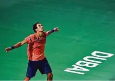  ?? Ahmed Ramzan/ Gulf News ?? Evgeny Donskoy (RUS), celebrates after winning against Roger Federer (SUI), during the second round match of the Dubai Duty Free Tennis Championsh­ips.