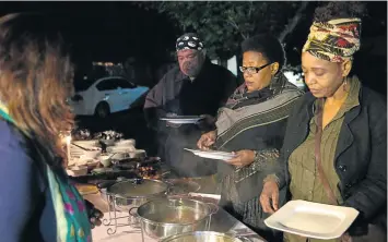  ??  ?? Fuaad Mathews, Sibongile Khumalo and Brenda Sisane tuck into the delicious curries