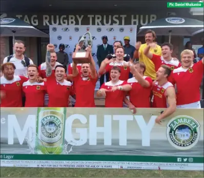  ?? ?? Pic: Daniel Nhakaniso
Germany national Sevens rugby team players celebrate with the winner’s trophy after beating Zimbabwe 19-17 in a tightly-contested final of the Zambezi Challenge at Harare Sports Club yesterday. The second edition of the Zambezi Challenge featured hosts Zimbabwe, Zambia, Botswana and Germany