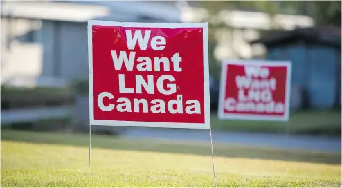  ?? BEN NELMS / BLOOMBERG FILES ?? Signs reading “We Want LNG Canada” in the residentia­l area of Kitimat, B.C. in 2016. The Shell-led consortium behind the liquefied natural gas export project is expected to announce a final investment decision in mid-2018.