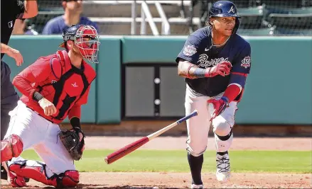  ?? CURTIS COMPTON/CURTIS.COMPTON@AJC.COM ?? Braves center fielder Cristian Pache hits what appeared to be a home run that was robbed at the wall by Red Sox right fielder Cesar Puello during the second inning of their spring training game Monday in Fort Myers, Florida.