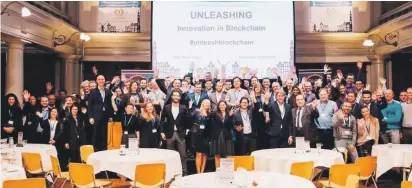  ??  ?? Delegates attending a two-day blockchain event in De Rode Hoed in Amsterdam