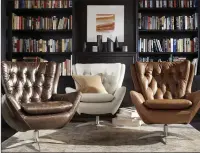  ?? Courtesy of Pottery Barn ?? The Wells swivel chair by Pottery Barn; with a nod to mid-century modern style, the Wells swivel chair incorporat­es classic detailing like tufting and the wing silhouette.