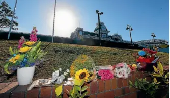  ??  ?? Flowers at the Dreamworld amusement park in Queensland, where four people were killed in an accident.