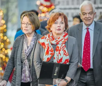  ?? RIC ERNST/PNG ?? Provincial Jobs Minister Shirley Bond, Surrey Mayor Linda Hepner and federal Immigratio­n Minister John McCallum, left to right, meet in Surrey on Wednesday outside of a news conference. McCallum was in Surrey to announce details about how refugees will be settled across Canada.