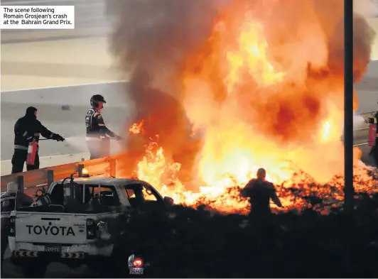  ??  ?? The scene following Romain Grosjean’s crash at the Bahrain Grand Prix.