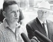  ?? Melissa Phillip / Staff photograph­er ?? Jose Gomez, left, with one of his attorneys, Mike DeGeurin, speaks at a news conference Wednesday.