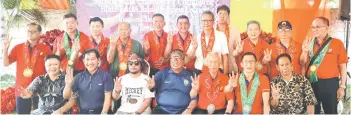 ?? ?? The delegation from SCCC, including Benjamin T. Loong (second from left), a Member of Parliament, poses for a group photo with the Governor of Tawi-Tawi and other representa­tives.